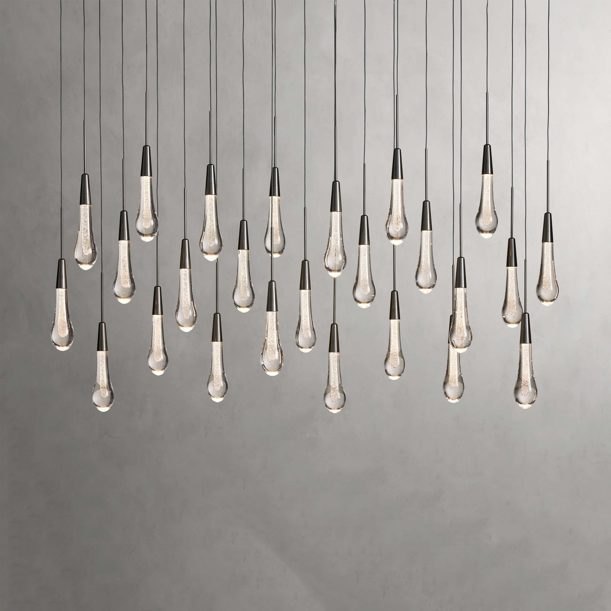 Denise Raindrop Glass Solitaire Linear Chandelier