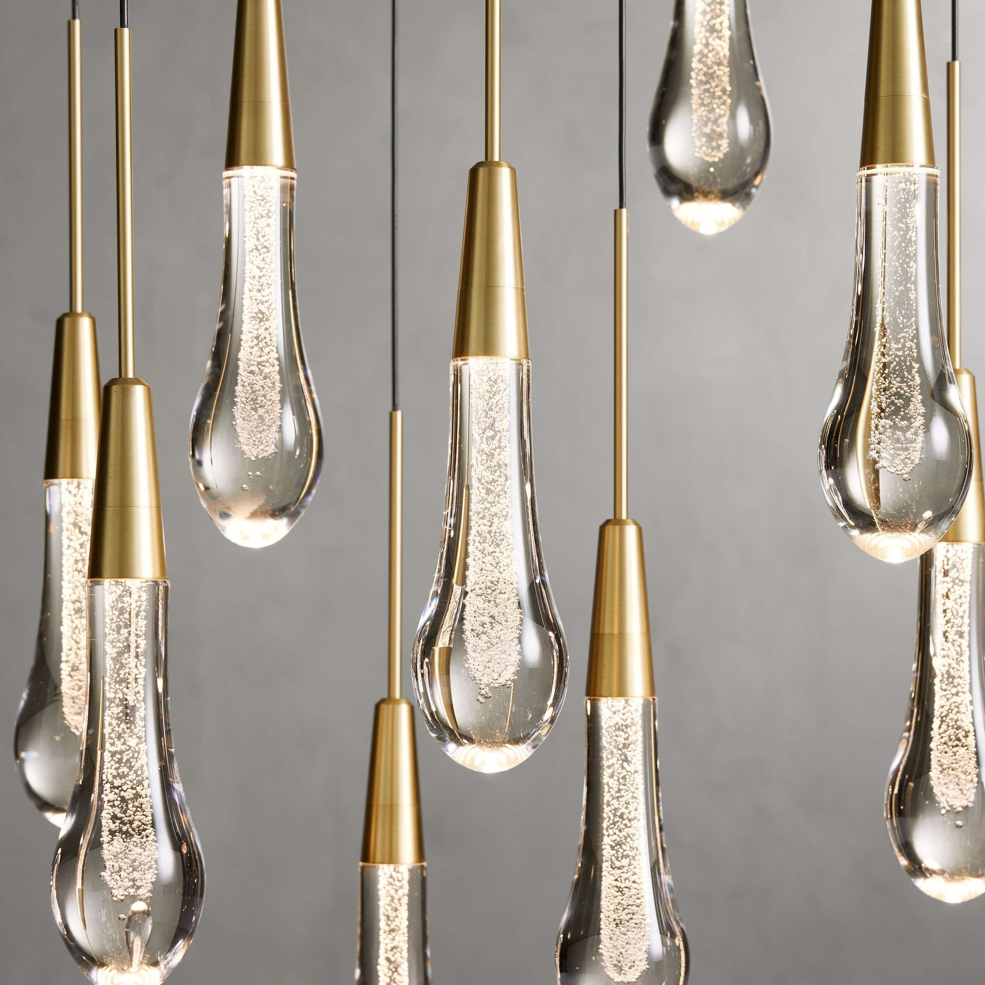 Denise Raindrop Glass Solitaire Linear Chandelier