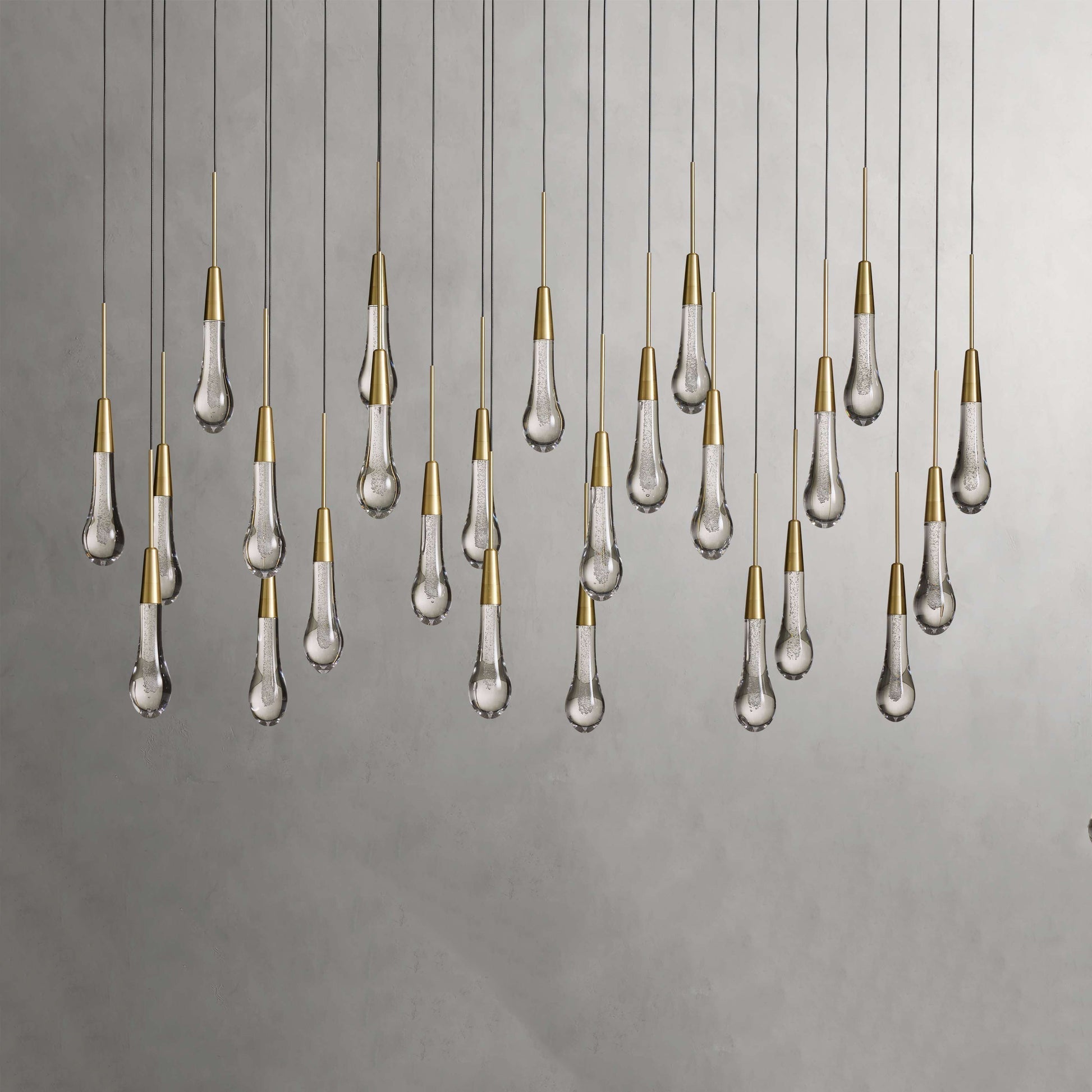 Denise Raindrop Glass Solitaire Linear Chandelier