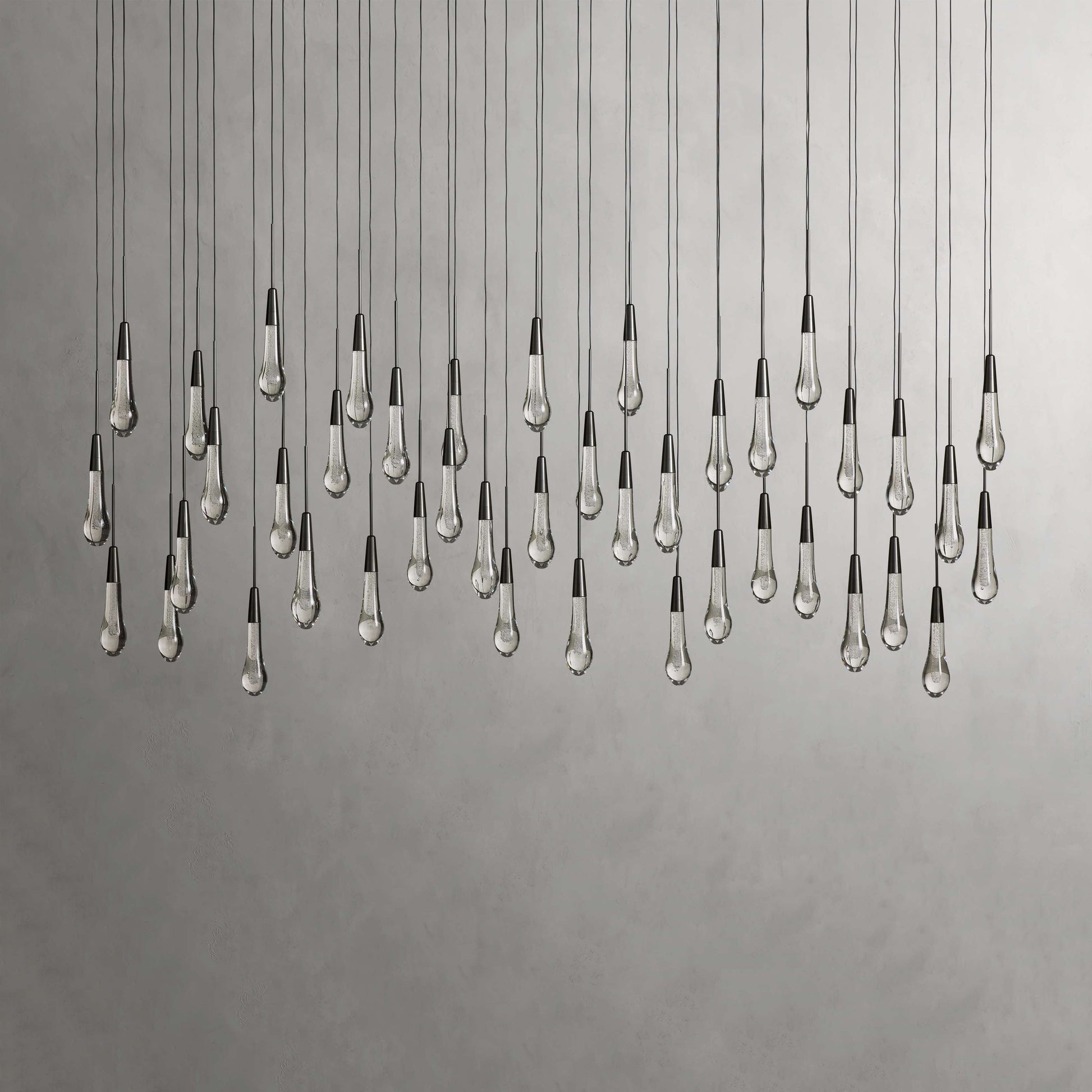 Denise Raindrop Glass Solitaire Linear Chandelier