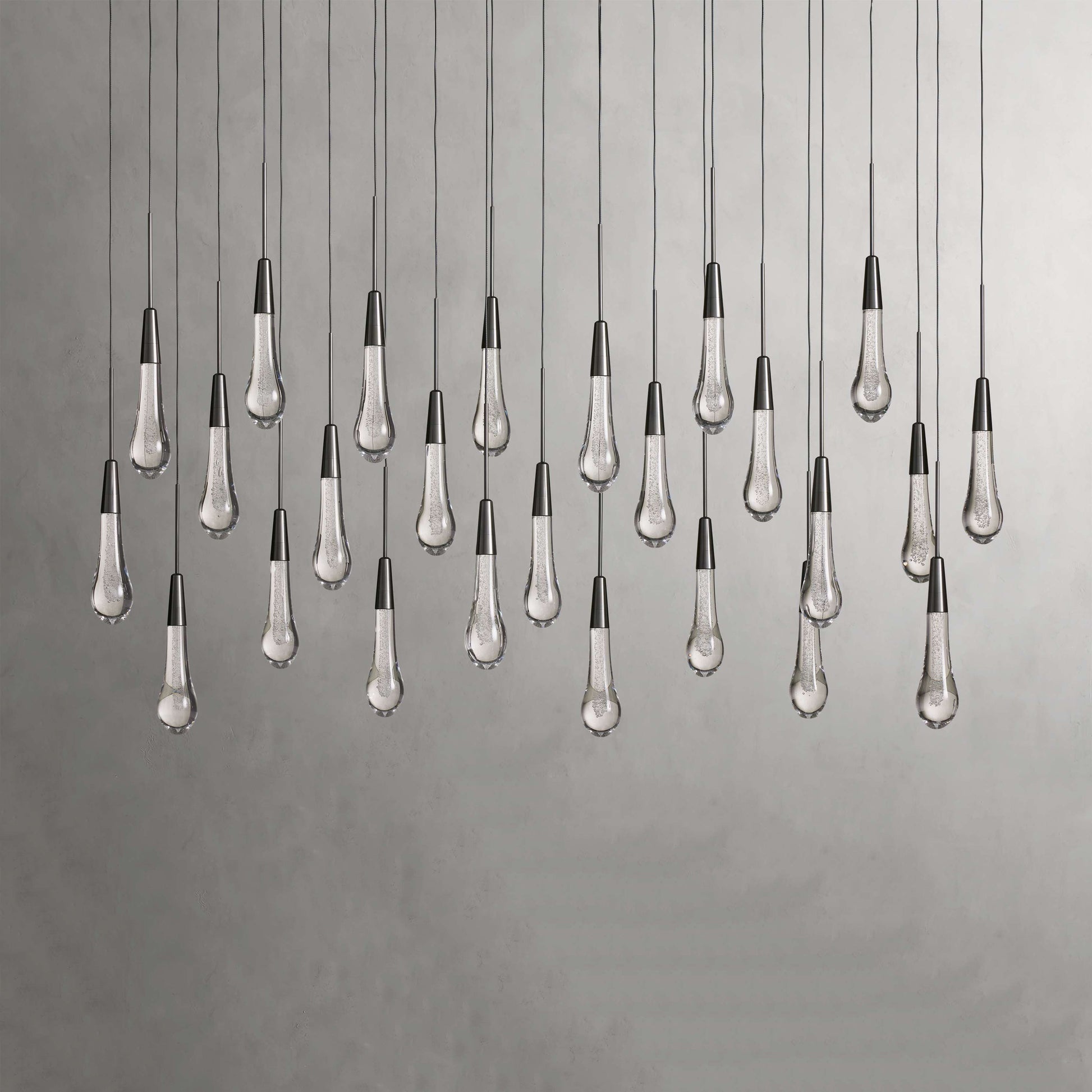 Denise Raindrop Glass Solitaire Linear Chandelier