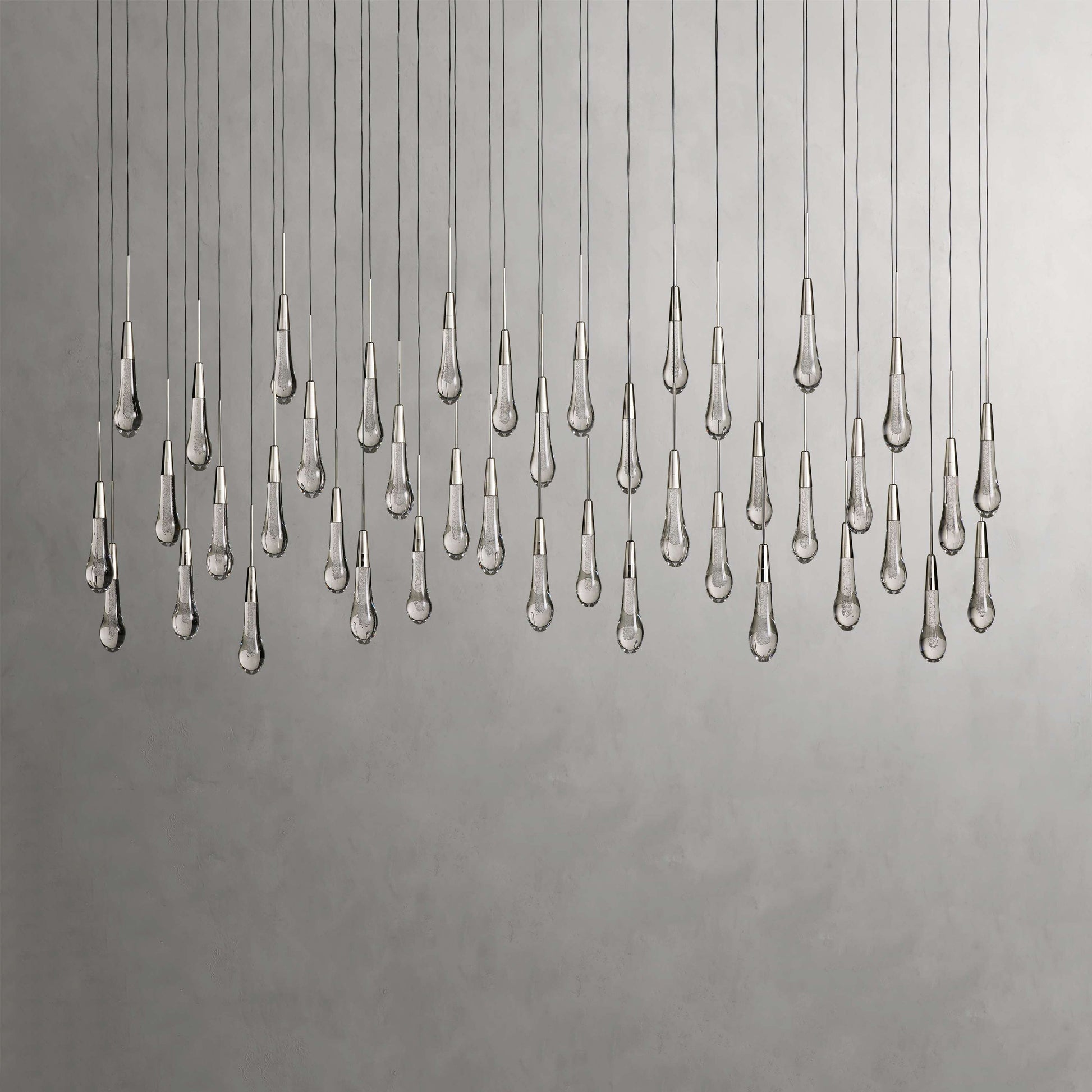 Denise Raindrop Glass Solitaire Linear Chandelier