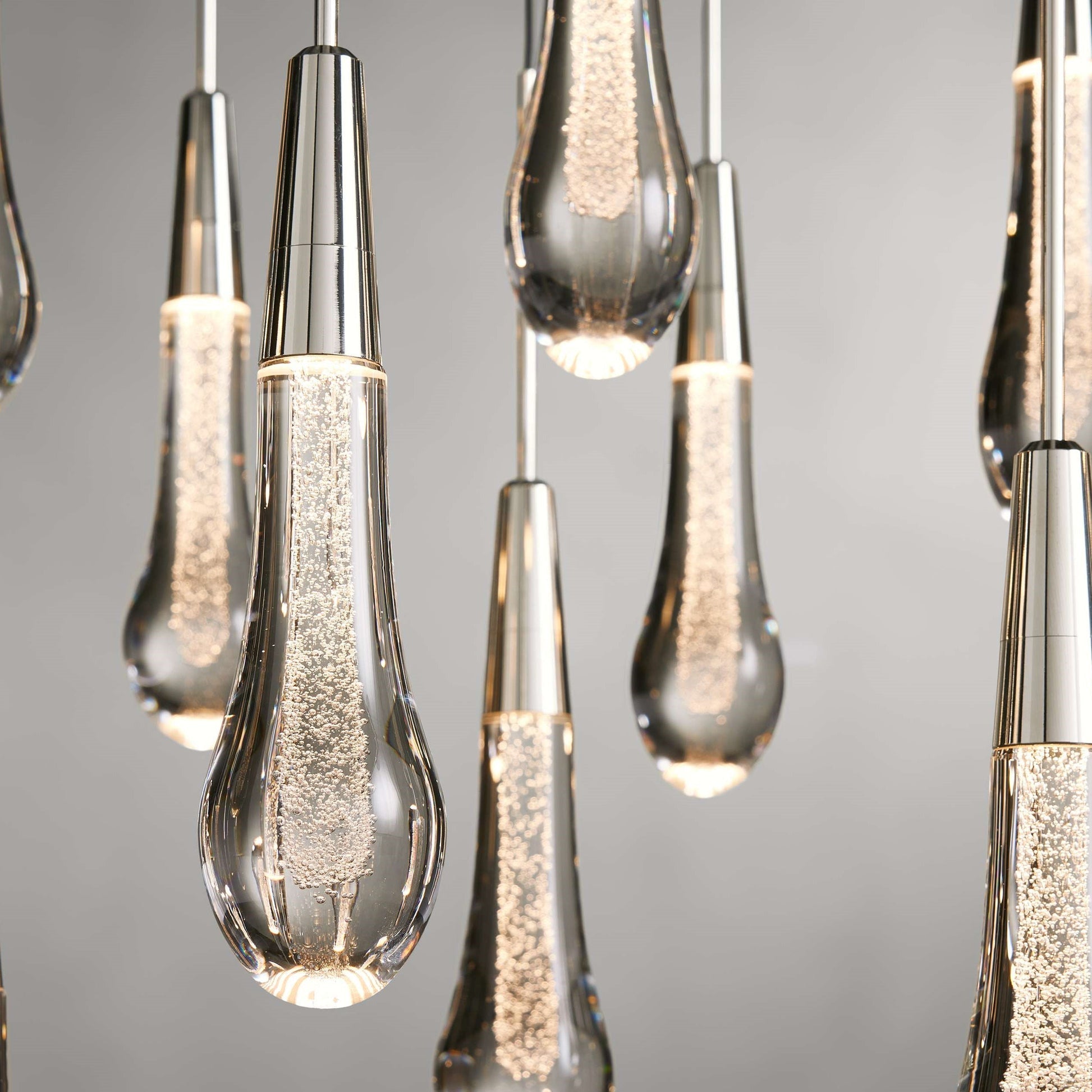 Denise Raindrop Glass Solitaire Linear Chandelier