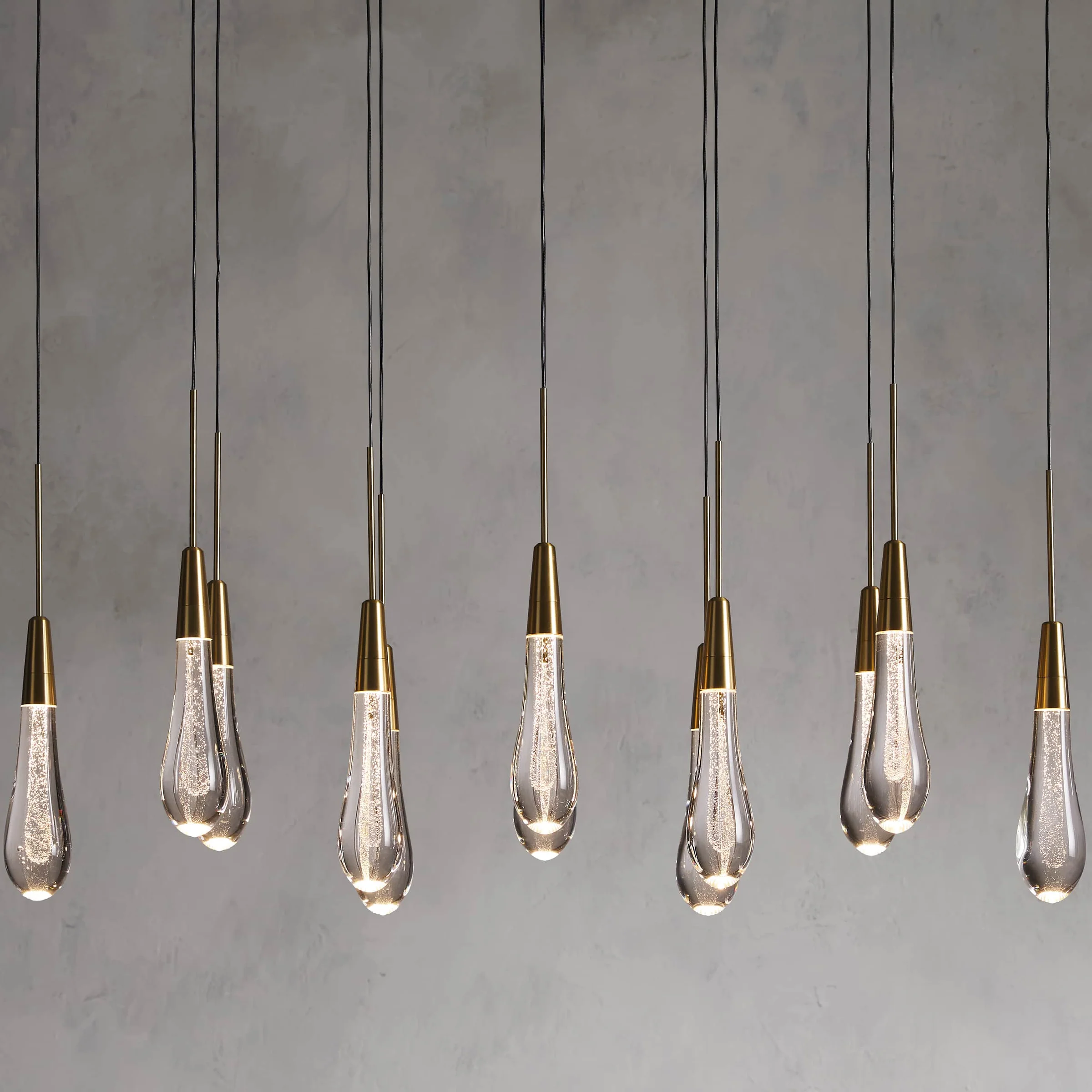 Denise Raindrop Glass Solitaire Linear Chandelier