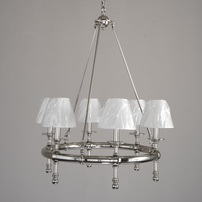 Chandelier with white lampshades on a gray background