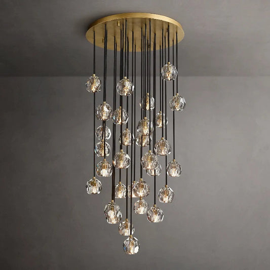 The hexagonal and pentagonal facets on the surface of the K9 glass spheres allow the warm light to reflect beautifully, creating a stunning and inviting ambiance. The overall design of the chandelier highlights its elegance and sophistication, making it a perfect addition to any room that needs a touch of glamour.